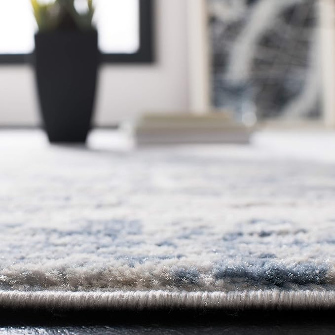 SAFAVIEH Amelia Collection Area Rug - 9' Round, Ivory & Blue, Modern Abstract Design, Non-Shedding & Easy Care, Ideal for High Traffic Areas in Living Room, Bedroom (ALA700A)
