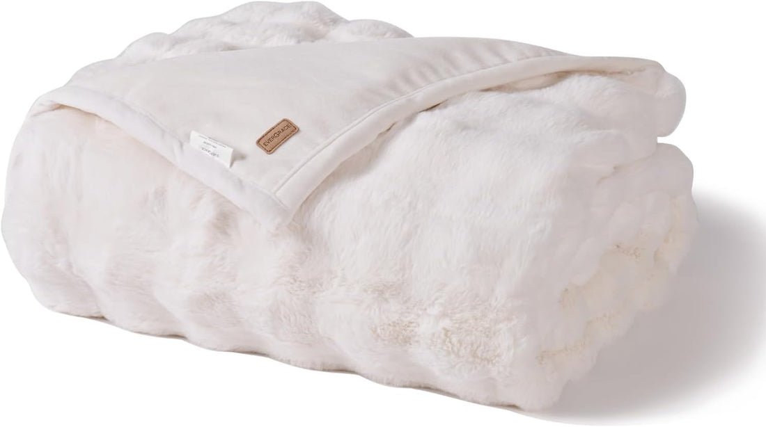 Ultra soft faux rabbit fur throw blanket in ivory white — luxurious cozy bedding essential for a calm sleep routine
