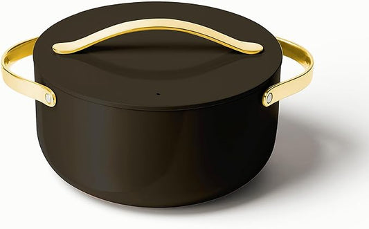 Caraway nonstick ceramic Dutch oven pot with lid in black — non-toxic PTFE-free cookware for calm, intentional cooking