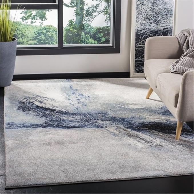 SAFAVIEH Galaxy Collection Area Rug - 9' x 12', Blue & Grey, Modern Abstract Design, Non-Shedding & Easy Care, Ideal for High Traffic Areas in Living Room, Bedroom (GAL117M)