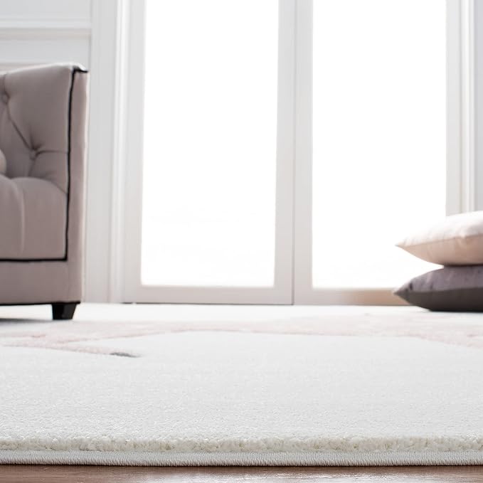 SAFAVIEH Carousel Kids Collection Accent Rug - 3'3" x 5'3", Ivory & Pink, Non-Shedding & Easy Care, Ideal for High Traffic Areas for Boys & Girls in Playroom, Nursery, Bedroom (CRK163A)