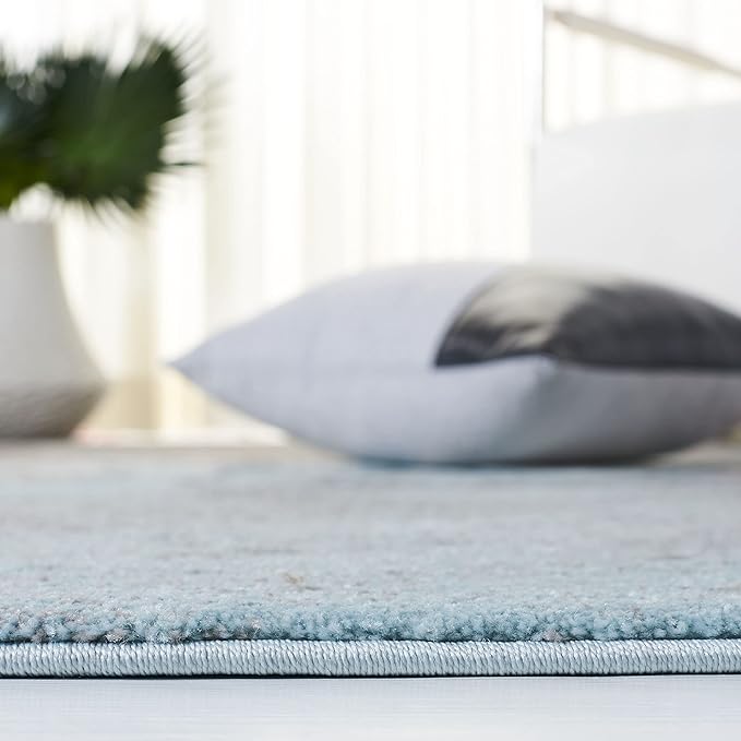 SAFAVIEH Glacier Collection Area Rug - 6'7" x 9', Blue & Pink, Modern Abstract Design, Non-Shedding & Easy Care, Ideal for High Traffic Areas in Living Room, Bedroom (GLA125L)