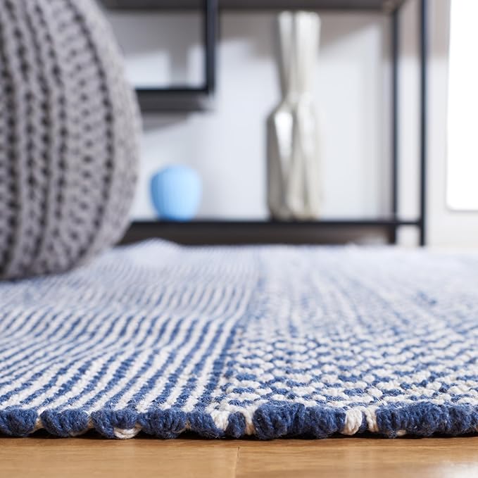 SAFAVIEH Montauk Collection Runner Rug - 2'3" x 18', Ivory & Navy, Handmade Flat Weave Boho Farmhouse Cotton Tassel Fringe, Ideal for High Traffic Areas in Living Room, Bedroom (MTK330B)