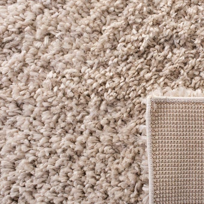SAFAVIEH August Shag Collection Area Rug - 6'7" x 9', Beige, Solid Design, Non-Shedding & Easy Care, 1.5-inch Thick Ideal for High Traffic Areas in Living Room, Bedroom (AUG200D)