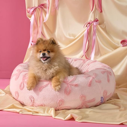 LE SURE Donut Small Dog Bed - Round Cat Beds for Indoor Cats Anti-Anxiety Calming Pet Beds, Washable Cute Modern Beds with Teddy Sherpa Plush & Anti Slip Bottom, 23 Inch, Pink Taffy