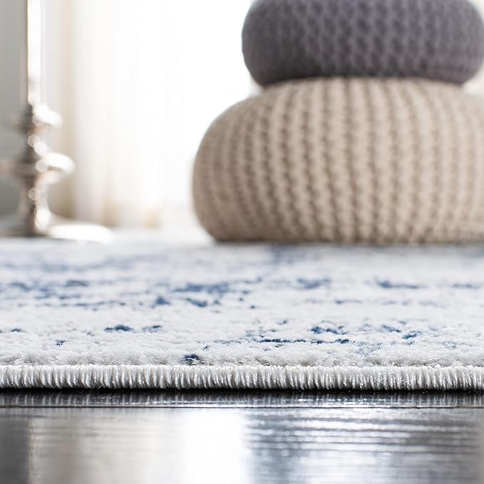 SAFAVIEH Amelia Collection Area Rug - 5'3" x 7'6", Ivory & Navy, Modern Abstract Design, Non-Shedding & Easy Care, Ideal for High Traffic Areas in Living Room, Bedroom (ALA700B)