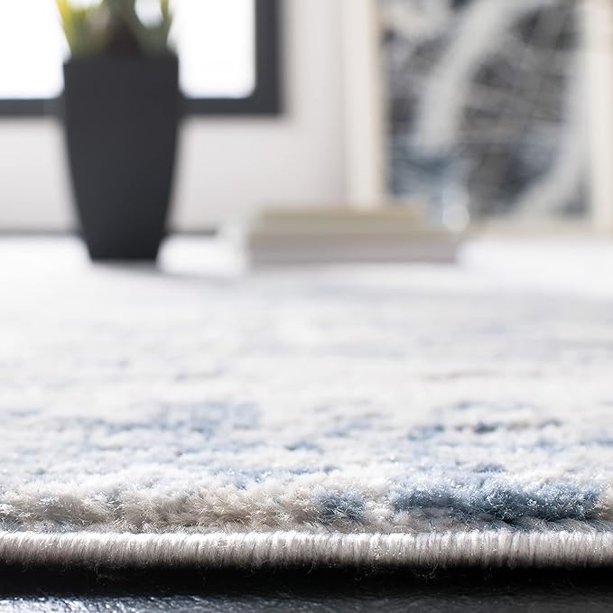 SAFAVIEH Amelia Collection Area Rug - 8' Round, Ivory & Blue, Modern Abstract Design, Non-Shedding & Easy Care, Ideal for High Traffic Areas in Living Room, Bedroom (ALA700A)