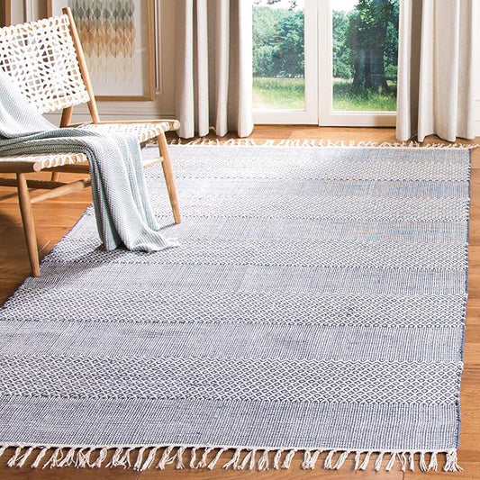 SAFAVIEH Montauk Collection Accent Rug - 3' x 5', Ivory & Navy, Handmade Flat Weave Boho Farmhouse Cotton Tassel Fringe, Ideal for High Traffic Areas in Entryway, Living Room, Bedroom (MTK330B)