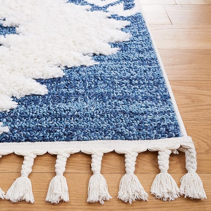 SAFAVIEH Moroccan Tassel Shag Collection Area Rug - 6'7" x 9'2", Blue & Ivory, Boho Design, Non-Shedding & Easy Care, 2-inch Thick Ideal for High Traffic Areas in Living Room, Bedroom (MTS652M)