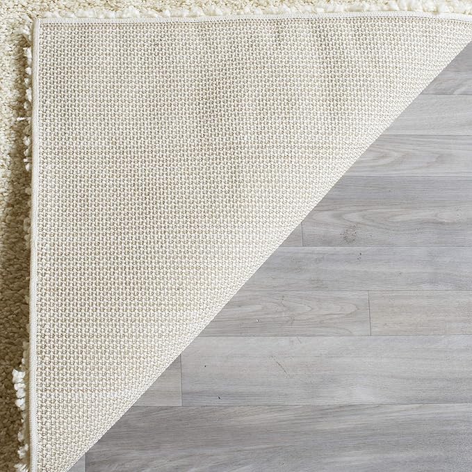 SAFAVIEH Santa Monica Shag Collection Runner Rug - 2'3" x 9' Runner, Ivory, Solid Design, 2-inch Thick Ideal for High Traffic Areas in Living Room, Bedroom, Dining (SGN725-1212-29)