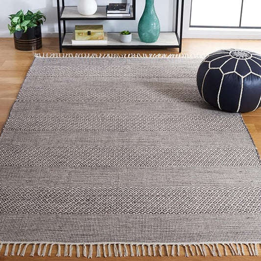 SAFAVIEH Montauk Collection Area Rug - 6' x 9', Ivory & Anthracite, Handmade Flat Weave Boho Farmhouse Cotton Tassel Fringe, Ideal for High Traffic Areas in Living Room, Bedroom (MTK330N)