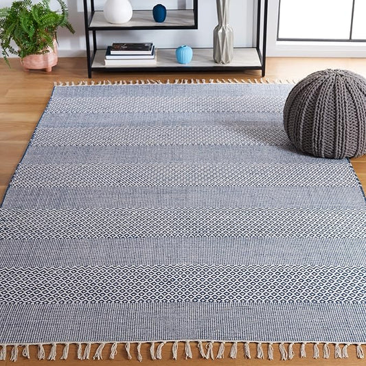 SAFAVIEH Montauk Collection Area Rug - 6' x 9', Ivory & Navy, Handmade Flat Weave Boho Farmhouse Cotton Tassel Fringe, Ideal for High Traffic Areas in Living Room, Bedroom (MTK330B)