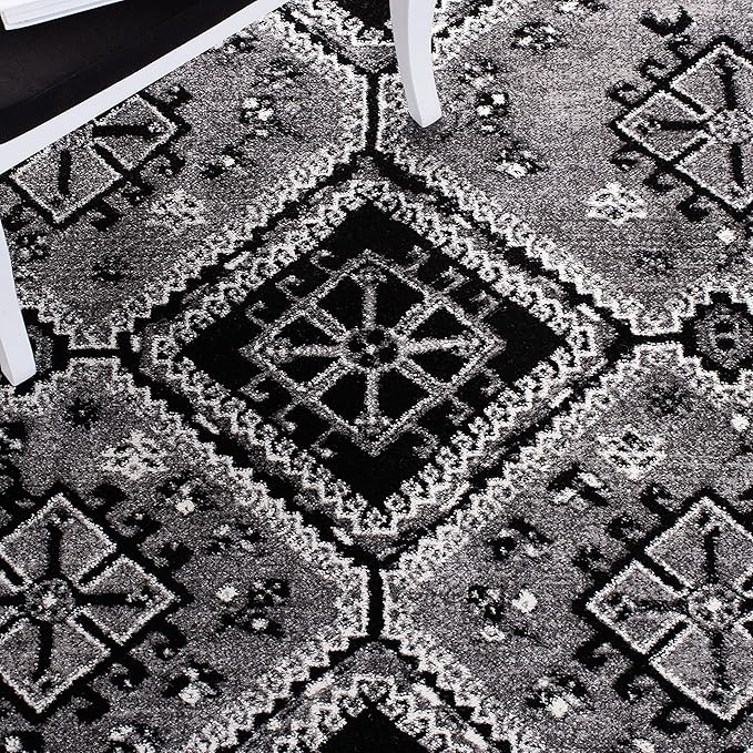SAFAVIEH Vintage Hamadan Collection Accent Rug - 2'7" x 5', Grey & Black, Oriental Distressed Design, Non-Shedding & Easy Care, Ideal for High Traffic Areas in Entryway, Living Room, Bedroom (VTH293F)